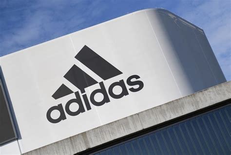 Adidas posts first loss in 30 years and warns on US 